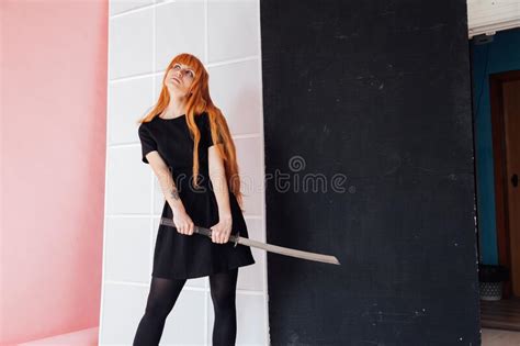 Portrait of a Beautiful Girl with a Japanese Sword Cosplayer Anime ...