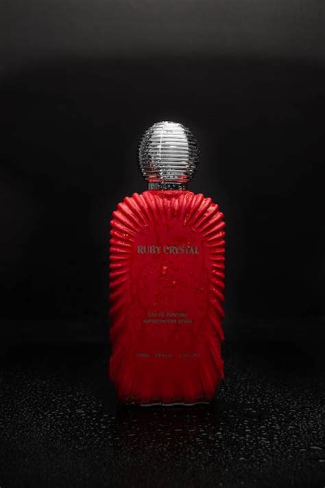 A Red Bottle of Perfume · Free Stock Photo