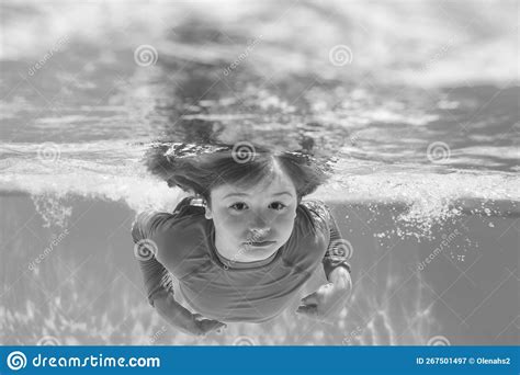 Kid Boy Swim Underwater in Sea. Kid Swimming in Pool Under Water Stock ...