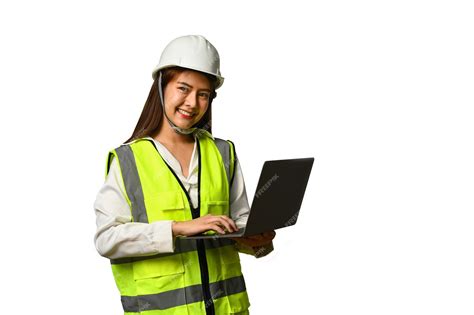 Premium AI Image | Smiling civil engineer woman wearing helmet and vest ...