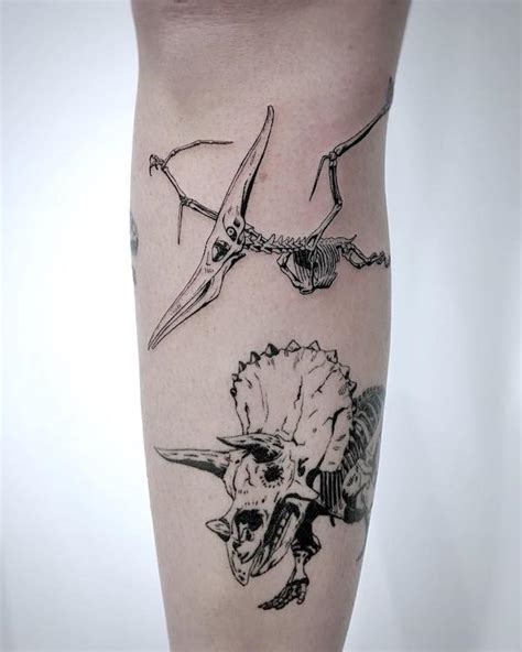 Share more than 77 dinosaur skeleton tattoo best - thtantai2