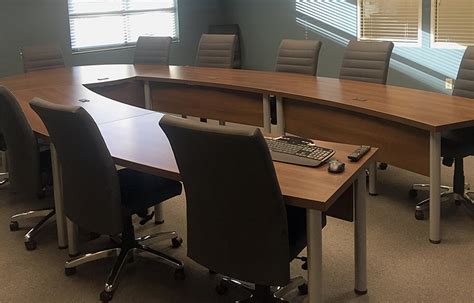 U-shaped Conference Table with Leather Conference Chairs