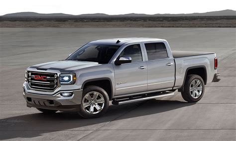 GM tries again with big hybrid pickups | Automotive News