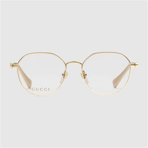 Round optical frame in gold-toned metal | GUCCI® US