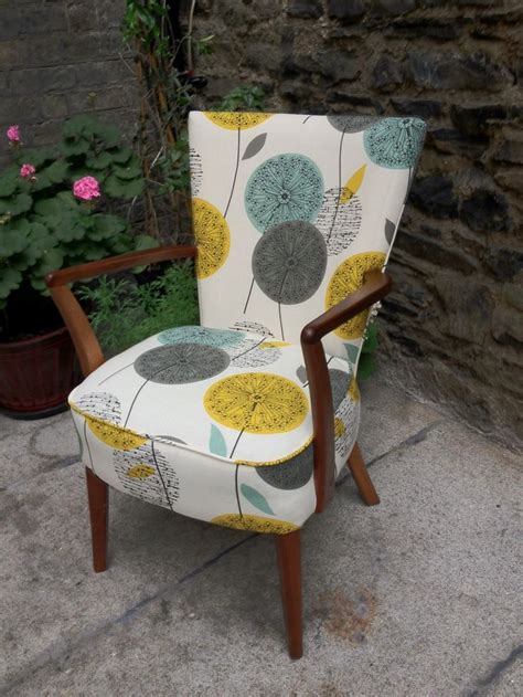 Upholstery fabrics. I love the design of the chair (mid-century modern ...