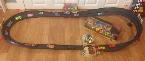 Disney Cars Piston Cup 500 Track Set With 22 Cars & Next Gen Racers ...