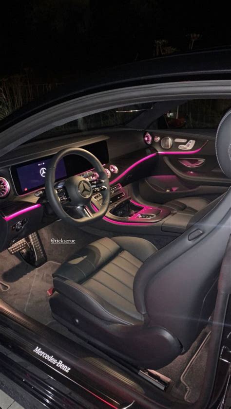 Luxury Car Interior with Pink Lights