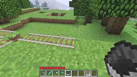 Minecraft Tutorial: How to Build a Minecraft Minecart Track - Howcast