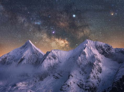 Amazing view of white snowy mountain range under incredible night ...