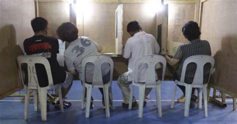 Pics: Filipino voters hit the polls in vital elections of over 18,000 ...