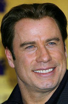 John Travolta shows off his drastically different hairline as he steps ...