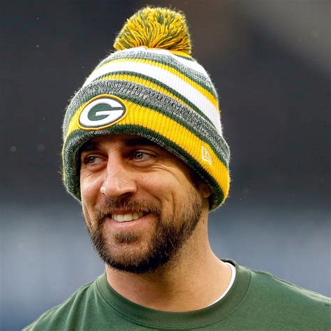 Green Bay Packers quarterback Aaron Rodgers signs with Adidas