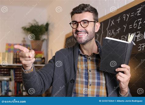 Teacher Pointing Someone with Finger in Classroom Stock Photo - Image ...