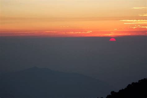 Tiger Hill , Sunrise @ 4 a.m. ,Pink rays of sun fall on mountains ...