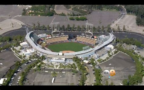 Fan critically injured in fight outside Dodger Stadium - CBS News