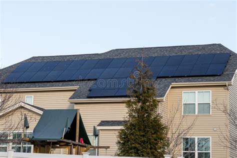 Solar panels on the roof stock image. Image of ecological - 309772291