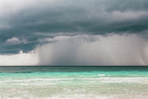 Rain Storm Over The Ocean And Beach by Sasha Weleber