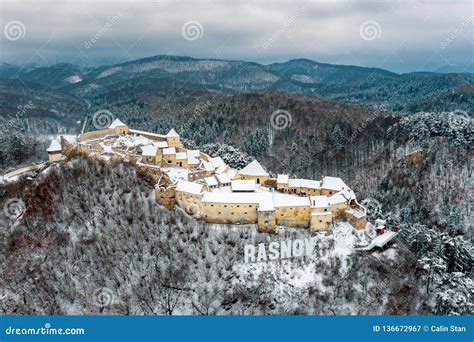 Aerial View of Rasnov Fortress Near Brasov in Romania after a Snowfall ...