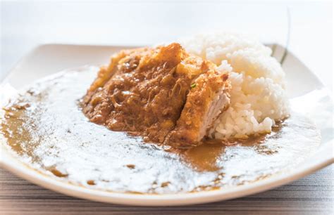 Premium Photo | Fried pork with curry rice