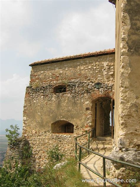 Rasnov, Romania - The entrance through the thick fortress wall | TouristBee