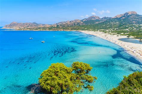 View of Ostriconi beach with beautiful sea lagoon, Corsica island ...