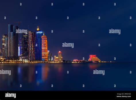 Illuminated Beautiful Doha Skyline after sunset Stock Photo - Alamy