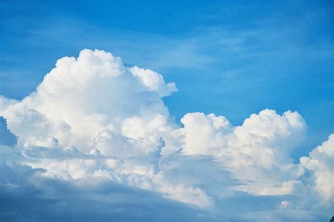 Royalty-Free photo: White clouds and clear blue sky | PickPik