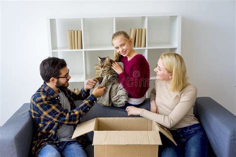 Family with a cat stock photo. Image of family, animal - 99306288