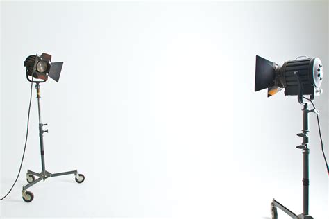 2 Black and Brown Studio Lighting in White Room · Free Stock Photo