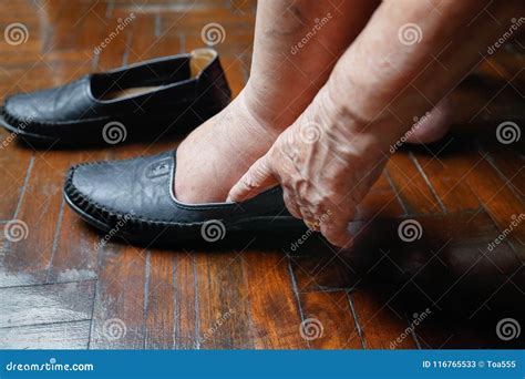 Elderly Woman Swollen Feet Putting on Shoes Stock Image - Image of ...