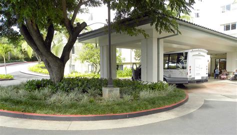 project: hotel entrance driveway landscaping - Swan Builders International