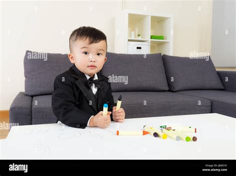 Baby boy drawing Stock Photo - Alamy