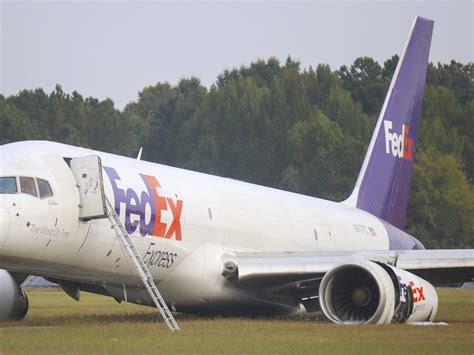 FedEx plane crash-lands at airport after landing gear malfunction ...