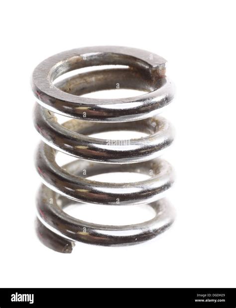 Metal steel industrial coil spring isolated on white Stock Photo - Alamy