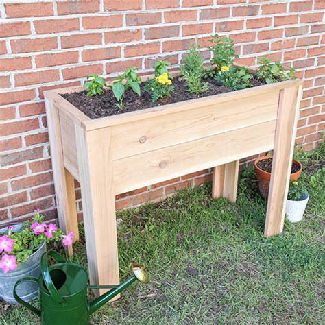 How to Build a Raised Garden Bed with Legs - Angela Marie Made