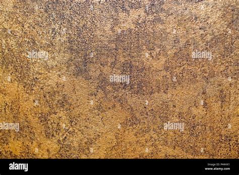 Golden paint rustic wall texture background Stock Photo - Alamy