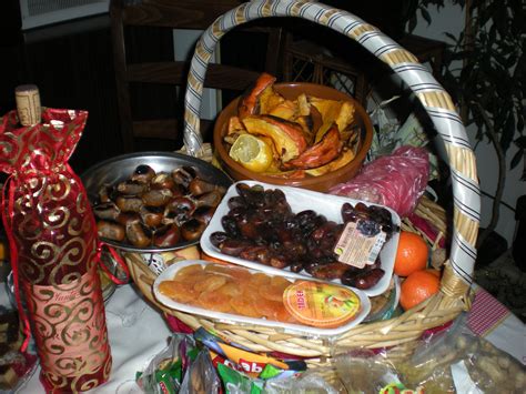 a basket full of food sitting on top of a table next to other foods and ...