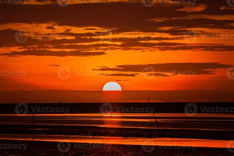 Red sunset at the beach 2009777 Stock Photo at Vecteezy