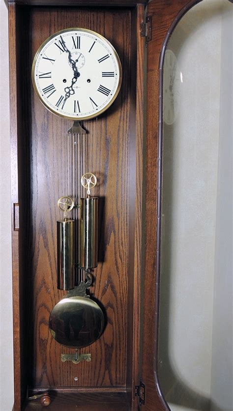 Howard Miller Pendulum Chiming Wall Clock | EBTH