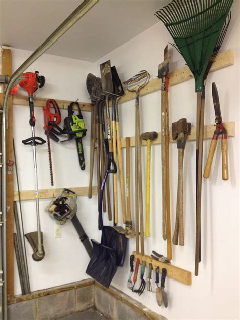 Great way to organize your tools in the garage. | Lawn tool storage ...