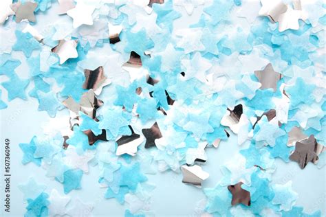 Blue background with confetti Stock Photo | Adobe Stock