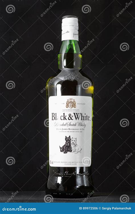 Black and White Scotch Whisky Bottle Closeup on Black Editorial Photo ...