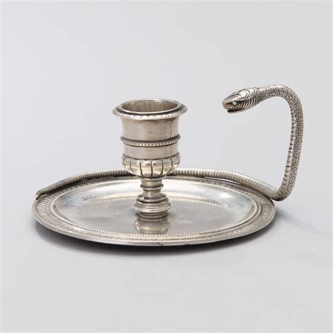 An early 19th century silver chamber candlestick. total weight 170 g ...