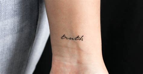 'Truth' temporary lettering tattoo placed on the wrist.