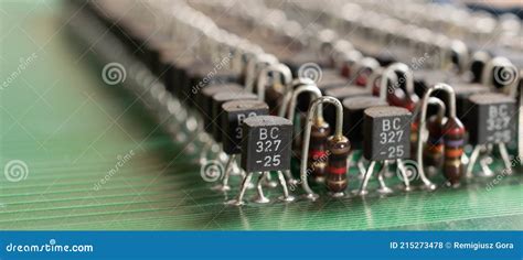 A Lot of Transistors in the Circuit Board. Arranged in Rows. Recycling ...