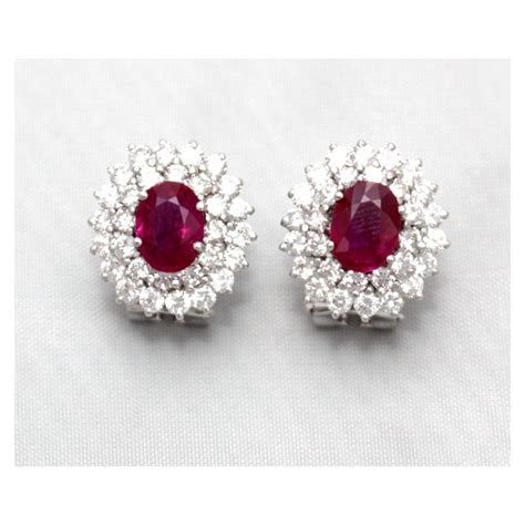 diamond and ruby earrings set in 18ct white gold