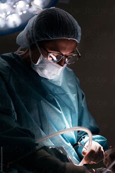 "Doctor Operating In The Hospital" by Stocksy Contributor "Santi Nuñez ...