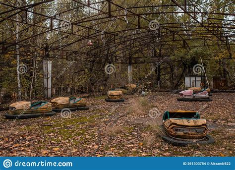 Abandoned Old Radiative Amusement Park with Rusted Attraction Cars in ...