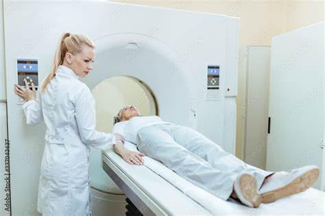 MRI scan procedure of mature female patient! Stock Photo | Adobe Stock