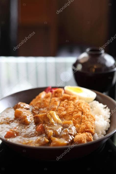 Curry rice with fried pork Stock Photo by ©piyato 18491667